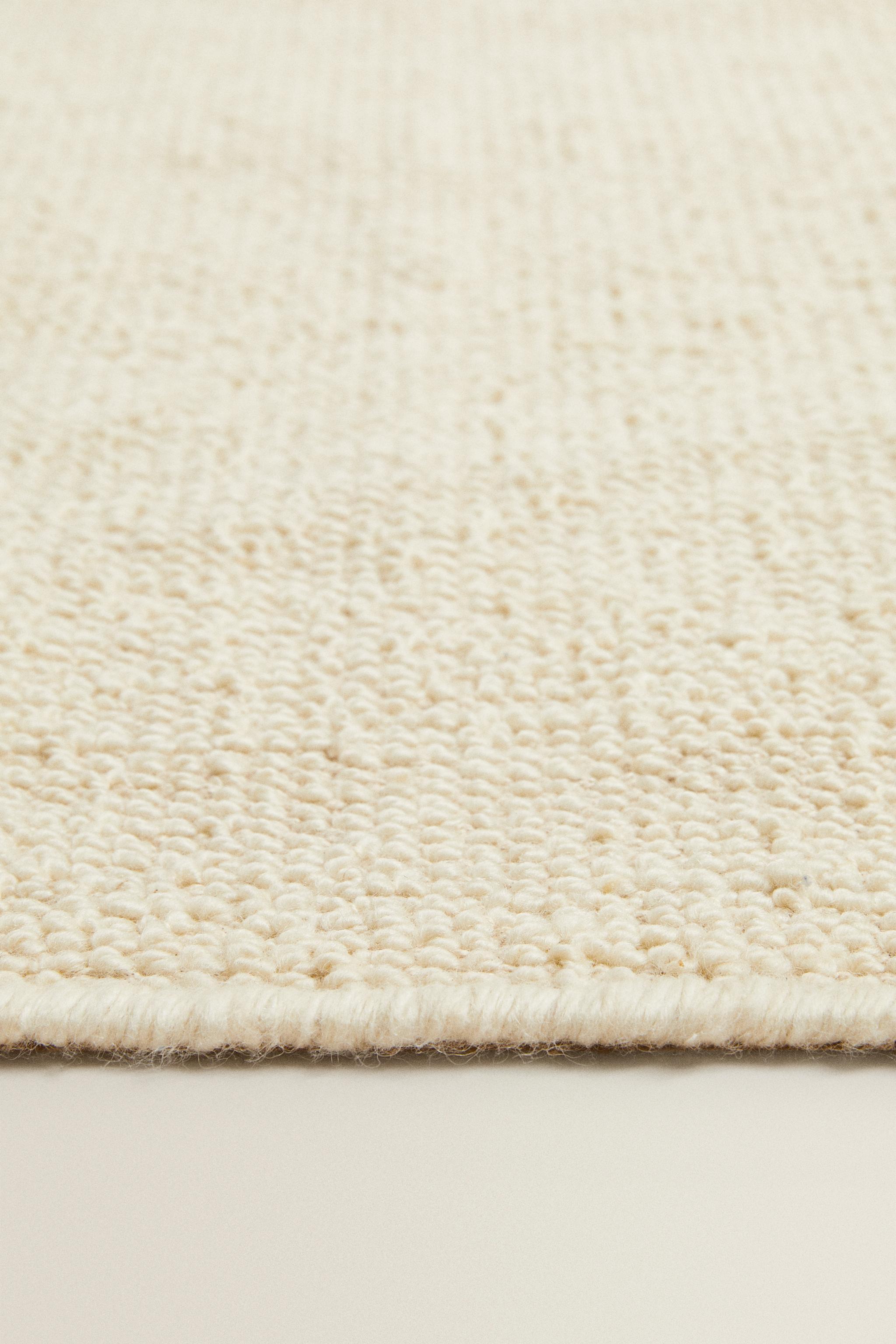 WAVY DETAIL WOOL AREA RUG